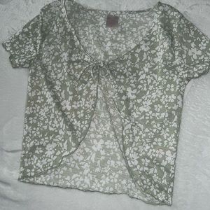 light green top with white flower print.